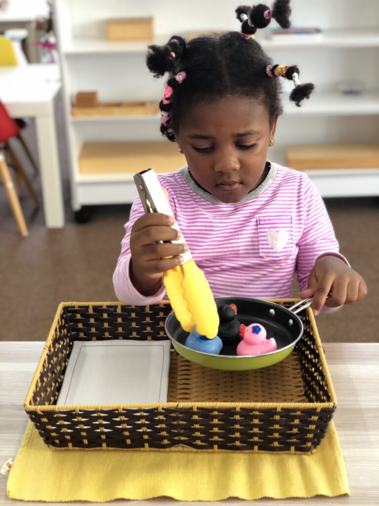 Transferring-using-tong-montessori-kids-academy-kuala-lumpur-malaysia